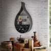 Botellero Drop de Cattelan Italia. Porta-botellas a pared en acero.