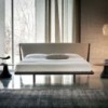 Cama Nelson de Cattelan Italia. Cama con estructura en madera de nogal o fresno.