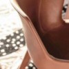 Silla Lou eat de Driade. Silla tapizada en cuero ideal para hogares, de comedor.