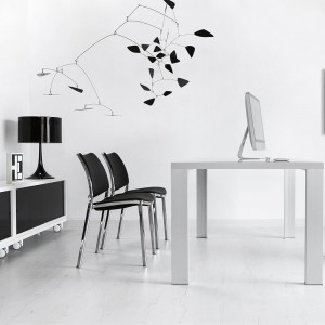 Sillón Gas Cromo Tapizado de Stua. Sillones de diseño moderno para salones u oficinas.