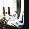 Espejo Glenn de Cattelan Italia en cristal reflejado para pared o suelo.