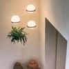 Lámpara suspensión Palma de Vibia. Diseño modeno para iluminación de salón.