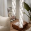 Lámpara suspensión Hugo vertical Slamp. Diseño ideal ideal para oficinas.