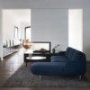 Sofá Lune chaise longue de Fritz Hansen con un diseño moderno de alto lujo.