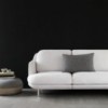 Sofá Lune esquinero de Fritz Hansen con un diseño moderno de alto lujo.