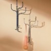 Perchero pared Coat Tree. Fritz Hansen de calidad superior, elegante y moderno.
