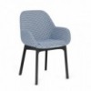 Butaca Clap tapizada de Kartell. Diseño ideal para ambientes interiores.