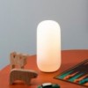 Lámpara sobremesa Gople Portable de Artemide. Diseño moderno y sofisticado.