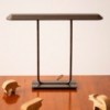 Lámpara sobremesa Tempio Artemide. Diseño moderno y elegante con calidez.