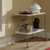 Mesa rectangular Flip de Kartell de acero coromado y selectos colores.