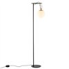 NH 22 de Artemide. Lámpara  estructura acero con anillo latón y vidrio soplado.