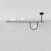 Lámpara Yanzi /SC1 de Artemide con un diseño único y elegante de suspensión.