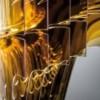 Lámpara de diseño suspendida Aria. Versiones en transparente o Gold.
