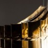 Lámpara de diseño suspendida Aria. Versiones en transparente o Gold.