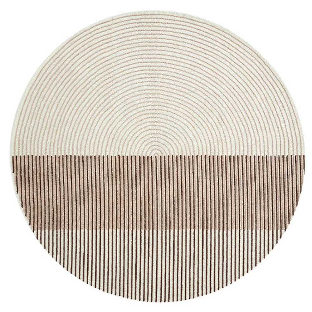Alfombra redonda de comedor Ply Pink de GAN. Alfombras de lana modernas.