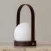 Lámpara portable Carrie de Audo Copenhagen. Lámparas de diseño portátil para su uso en interiores o exteriores.