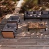 Sofá de diseño moderno modular 3 DNA Teca para jardín de Gandia Blasco.