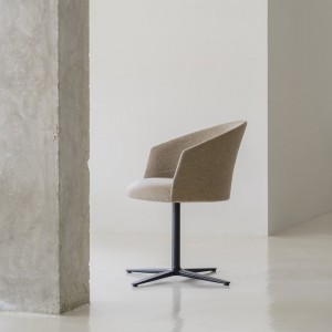 Sillón tapizado Copa base giratoria de Viccarbe. Mobiliario de diseño.