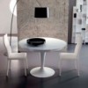 Mesa Eclipse extensible con sobre cristal o cerámica de Ozzio design.